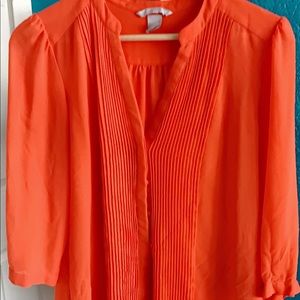 Orange color blouse